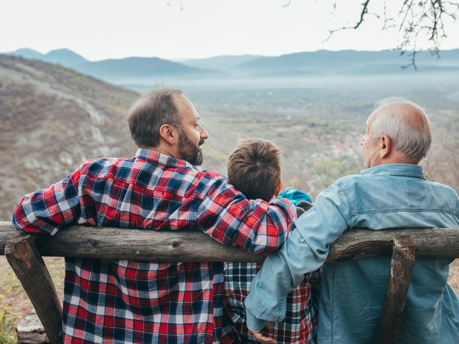 Three generations of a family spending time together outdoors