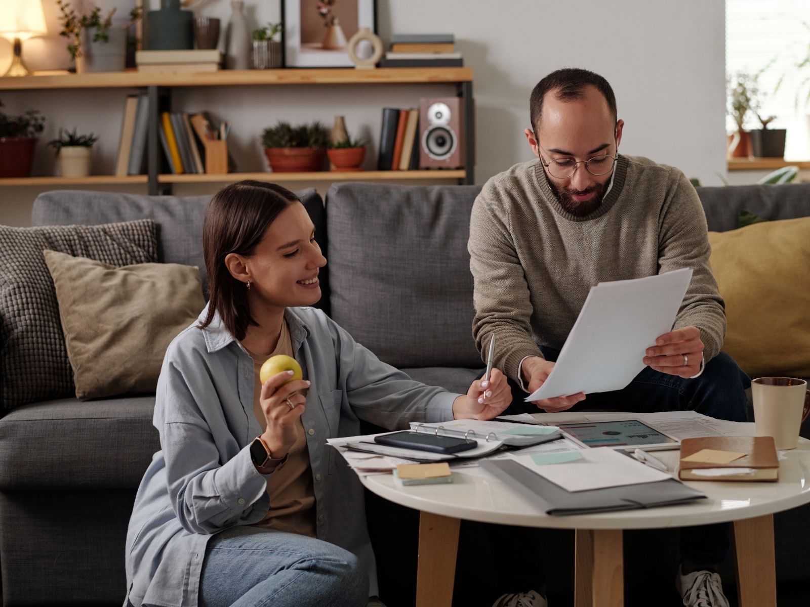 Couple reviewing financial information together at home